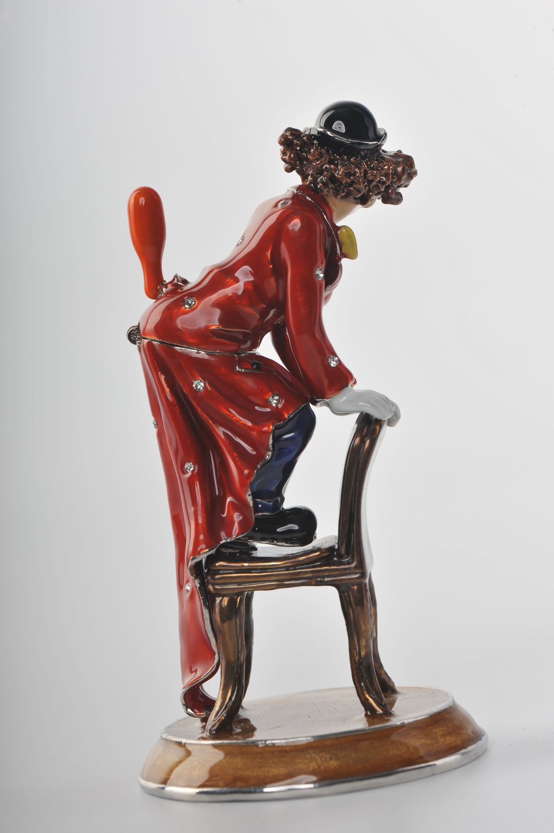 Keren Kopal Clown Standing on a Chair