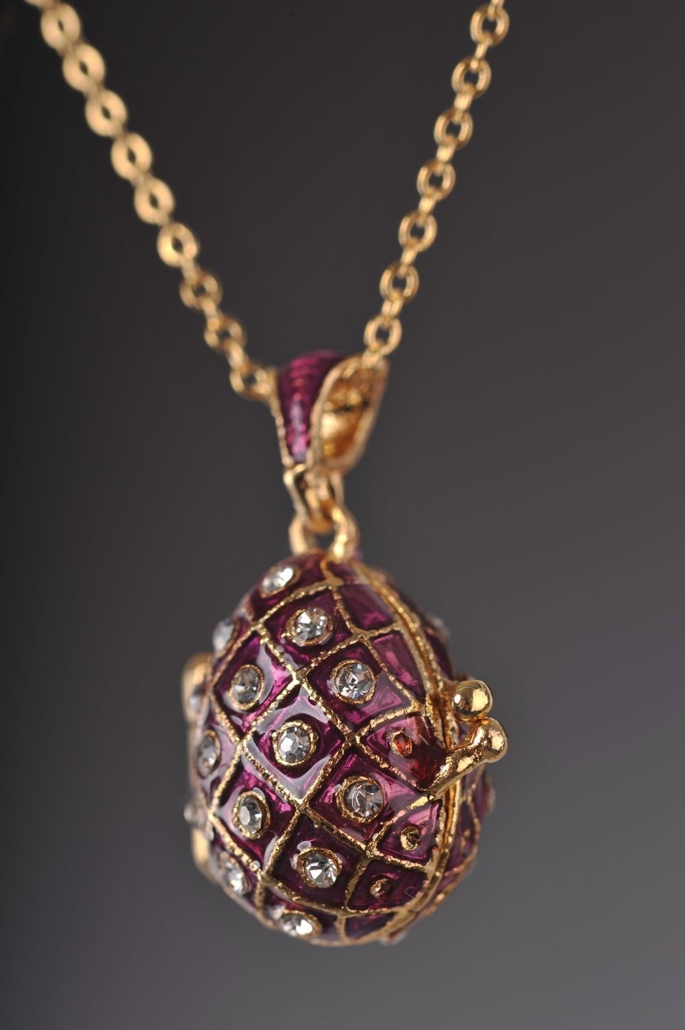 Keren Kopal Egg Pendant Necklace with an Apple inside