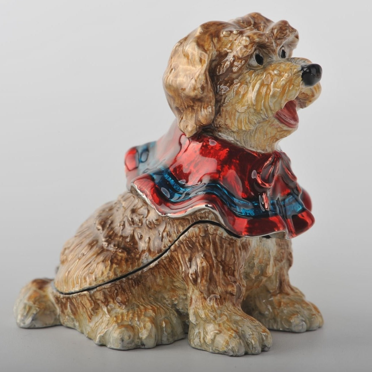 Keren Kopal Sitting Dog