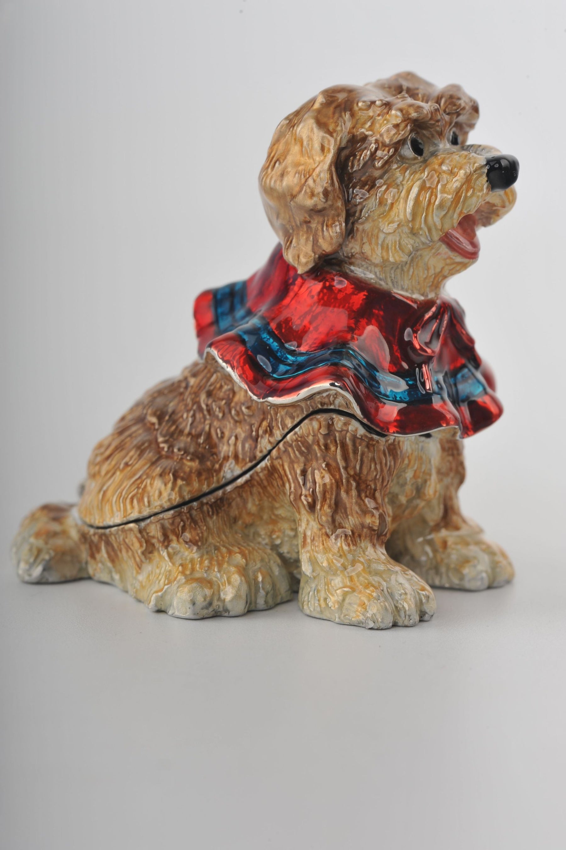 Keren Kopal Sitting Dog