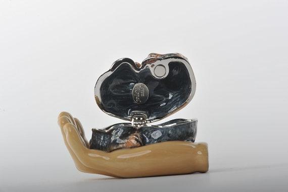 Keren Kopal Zodiac Monkey Laying on Hand