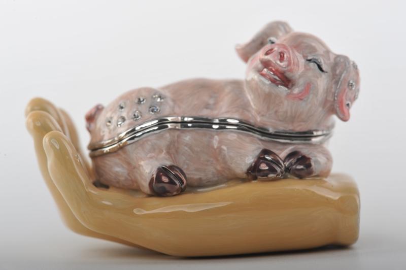 Keren Kopal Zodiac Pig Laying on Hand