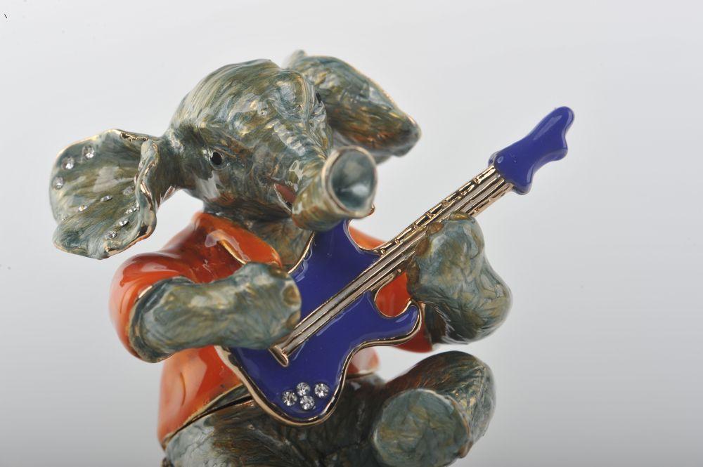 Keren Kopal Elephant Playing a Purple Guitar