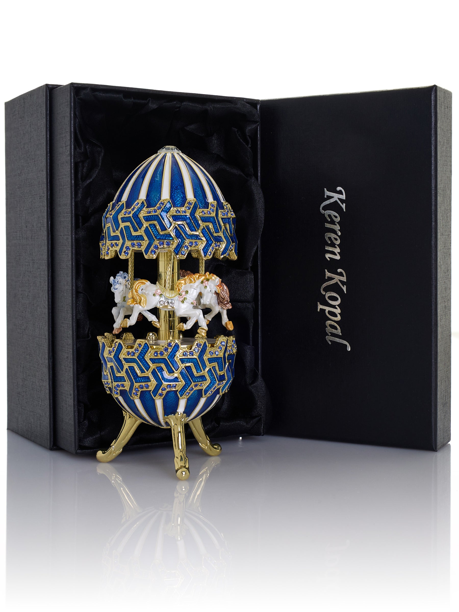 Blaues Faberge-Ei mit Pferdekarussell zum Aufziehen