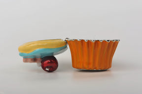 Keren Kopal Blue and Yellow Frosting Cupcake