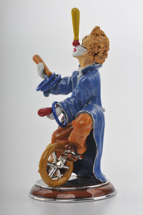 Keren Kopal Circus Clown Juggles on a Unicycle