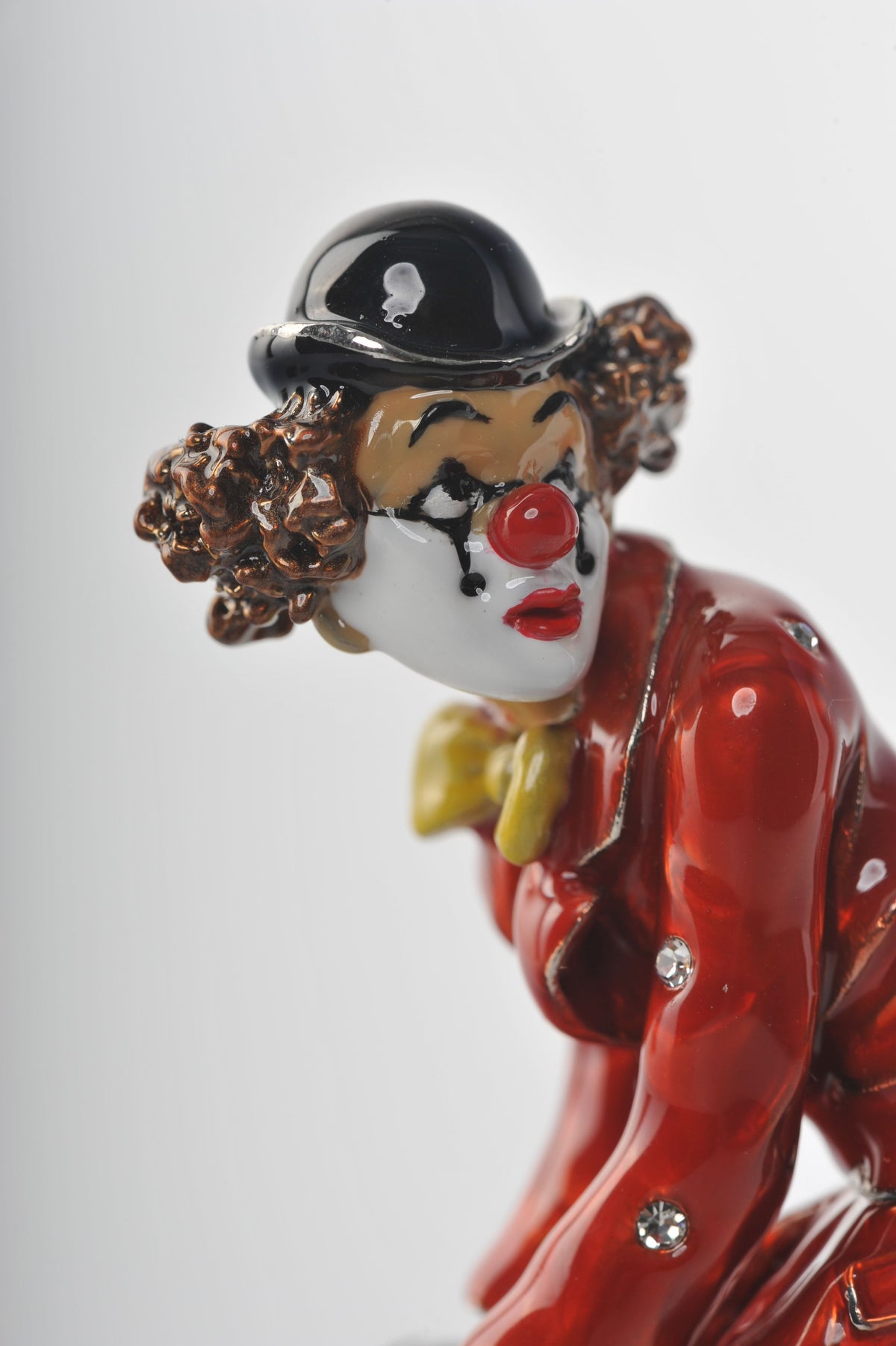 Keren Kopal Clown Standing on a Chair
