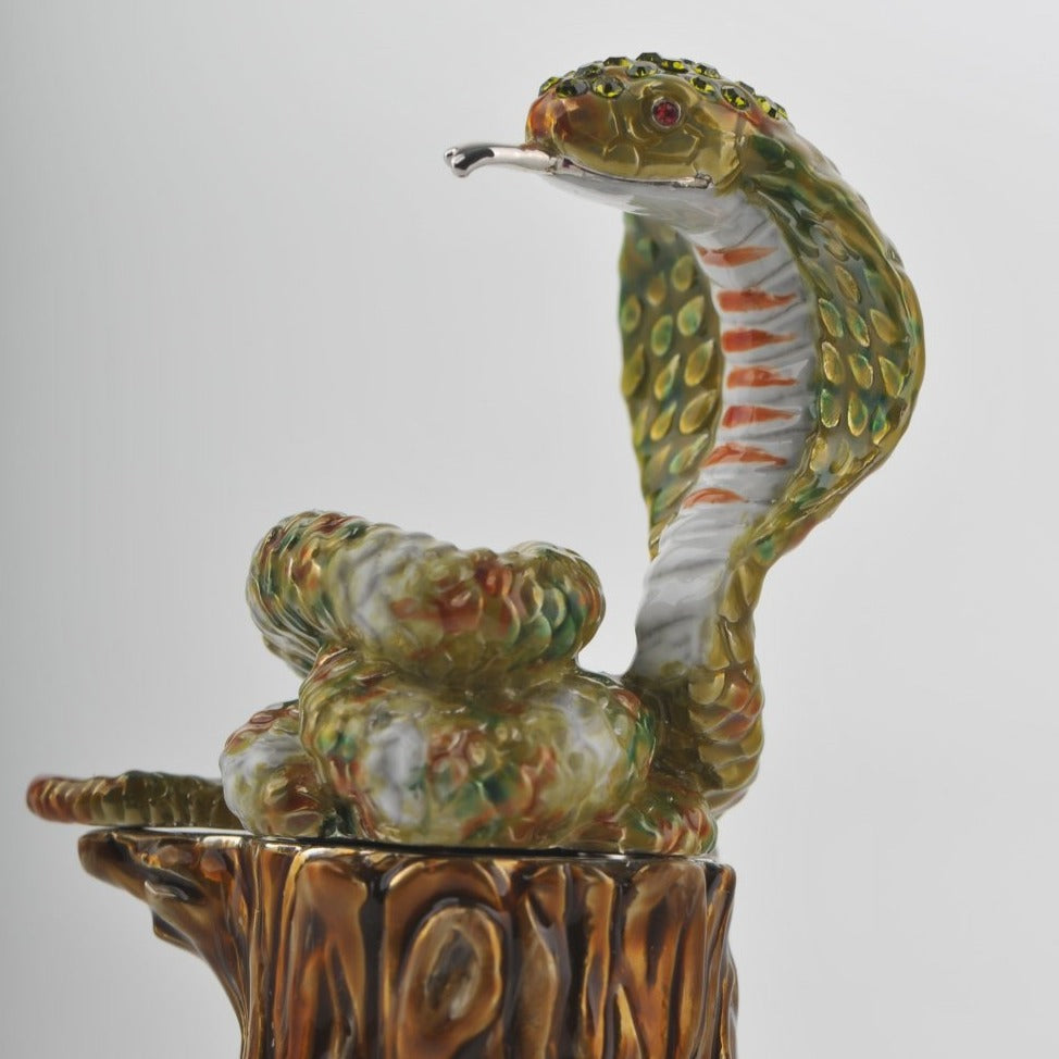 Keren Kopal Cobra Snake on Tree Trunk