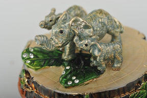 Keren Kopal Three Elephants on Tree Trunk