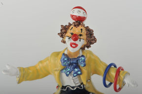 Keren Kopal Yellow Circus Clown Juggling on Unicycle
