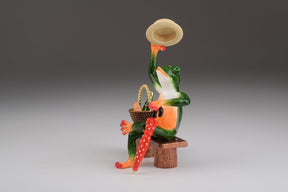 Keren Kopal Green Frog on a Bench